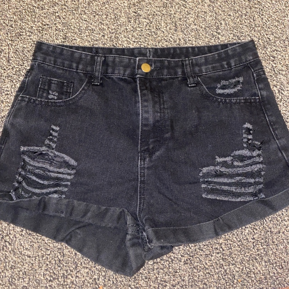 Black ripped shorts